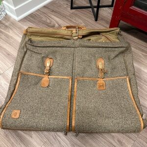 Vintage Hartmann Tweed and leather hanging garment travel bag.